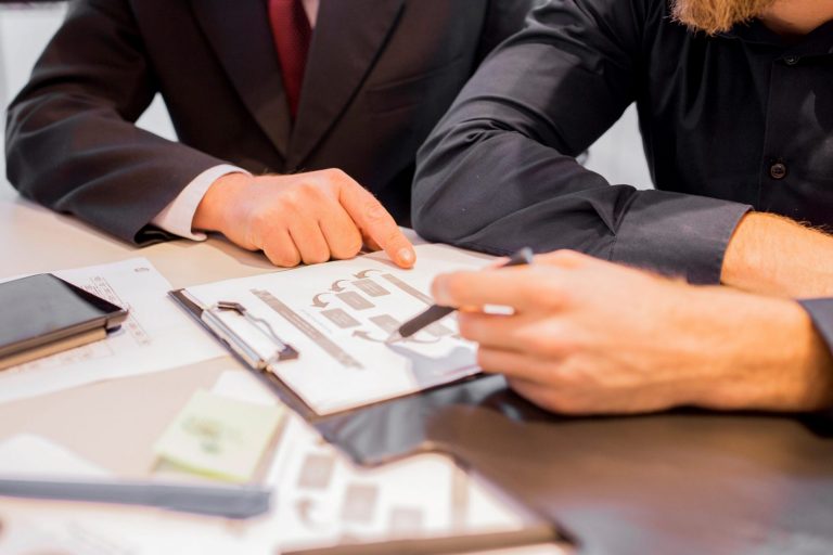 lawyer-client-FP Lawyer with client illustrates blog "How to determine if you need a lawyer"