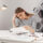 person stressed after they miss court date reviewing legal paperwork