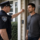 police officer conducting warrantless searches discussion at home