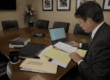 defense attorney reviewing how to challenge evidence in court