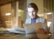 Person reviewing paperwork about the need to address criminal charges early