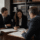 Professionals reviewing bring first meeting criminal strategy and planning documents